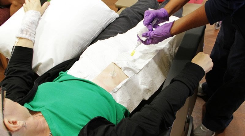 This shows a person receiving chemo