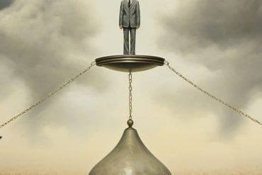 This shows two people standing at a scale.