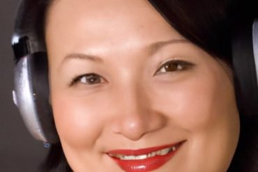 This shows a woman listening to music