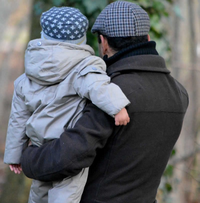 This image shows a father with his child.