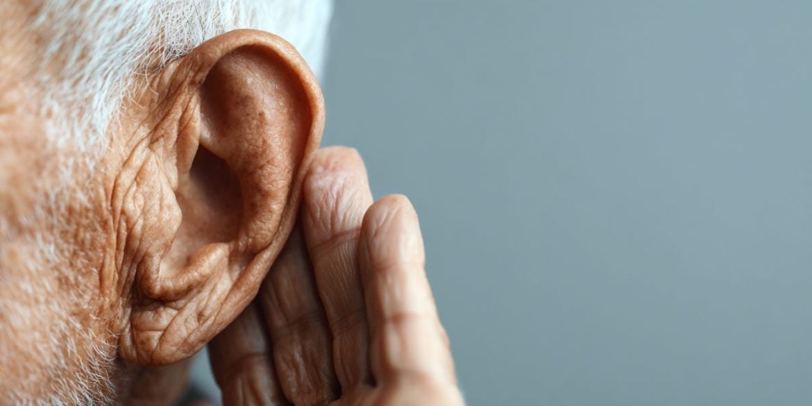 This shows an older man cupping his ear.