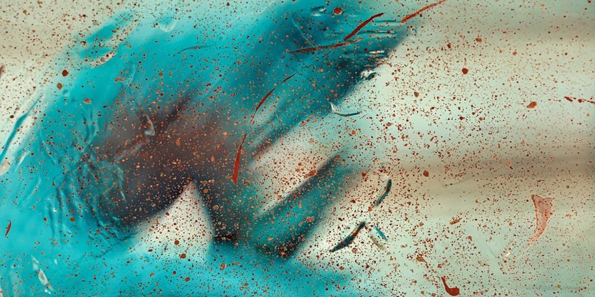 This shows a blurry blue man