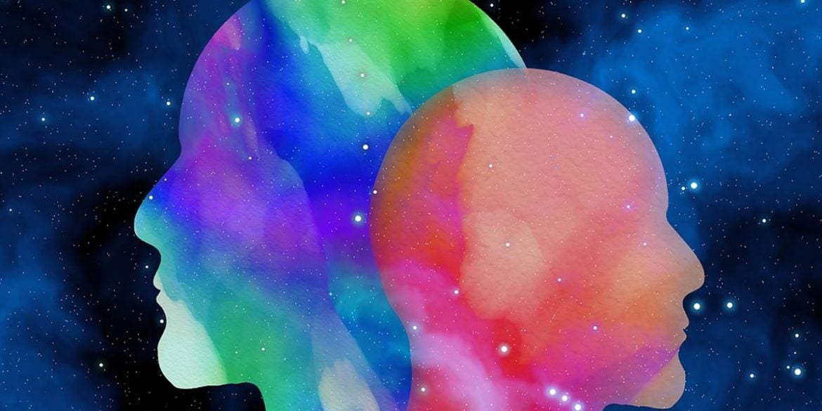 This shows two heads with a psychedelic background